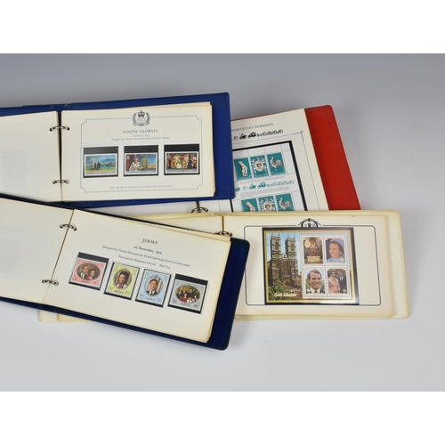 809 - Philately - Four Stanley Gibbons Royal souvenir stamp binders, to include Commonwealth countries Nov... 