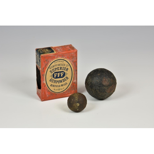 810 - A rare German Gunpowder Co (FFF) Benfield Mills tin and two cannon balls - round shot, the shots mea... 