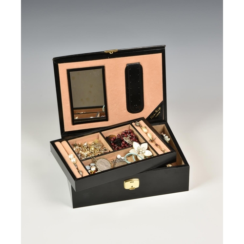 811 - A collection of vintage costume jewellery, to include earrings, necklaces and others, housed in a Ni... 
