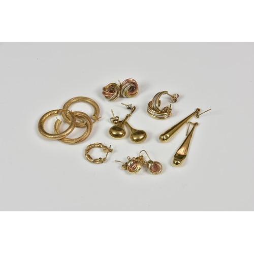 814 - A small collection of 9ct gold earrings, to include a pair of tight twist loop earrings and a single... 