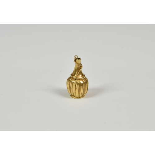 818 - An 18ct (tested) yellow gold Chianti Wine bottle charm - 2.0g.,