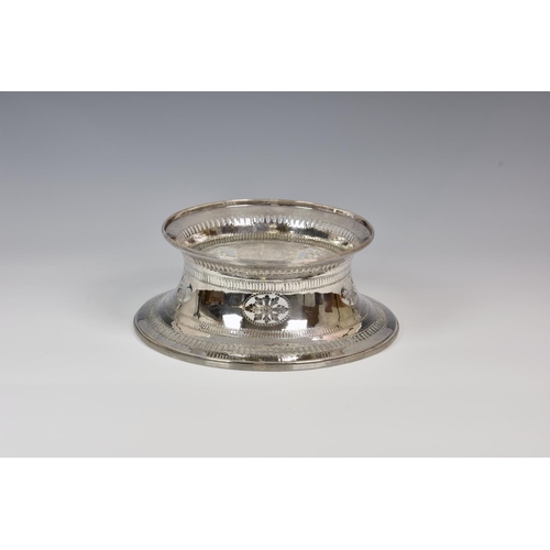 825 - A late 19th / early 20th century silver plate potato ring, of typical circular waisted form, having ... 