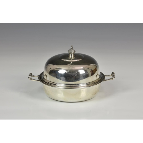 829 - A small silver twin handled dish & cover, Mappin & Webb Ltd., London 1936, circular form with domed ... 