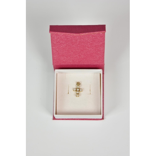 921 - A 9ct gold and six stone opal cross pendant,
