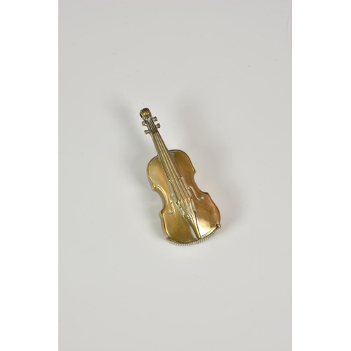 946 - An Edwardian novelty brass vesta case fashioned as a cello, the well detailed vesta case with hinged... 