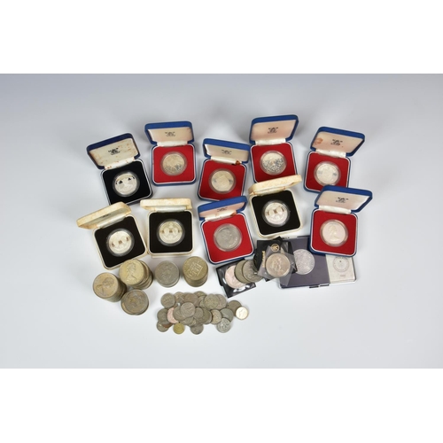 952 - A large collection of Commemorative Guernsey coins, to include three boxed silver proof Prince of Wa... 