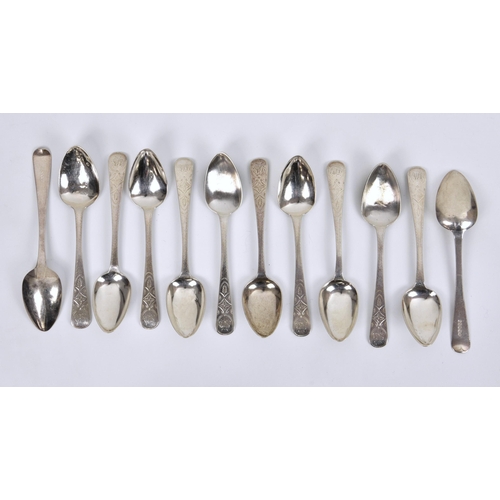 1002 - A set of twelve Channel Islands silver Old English pattern bright cut teaspoons, Sheffield, 'J', ove... 