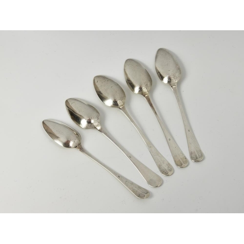 1007 - A set of five late 18th century Channel Islands silver Old English pattern shell back teaspoons, mak... 