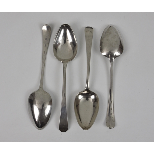 1009 - A set of four Channel Islands silver Old English pattern table spoons, maker's mark PN, struck three... 