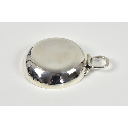 1014 - A Channel Islands silver tastevin, Bruce Russell, Guernsey, 1997, of typical form with loop handle, ... 