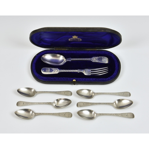 1016 - A cased Edwardian silver fiddle pattern bright cut spoon and fork set, in a leather case with fitted... 