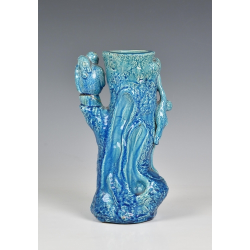 12 - A Majolica turquoise glazed macaques vase, late 19th / early 20th century, the Orientalist vase mode... 