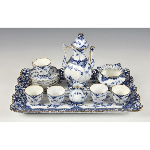 133 - A Royal Copenhagen cabaret set in Blue Full Face pattern, each piece enriched with blue and white fl... 