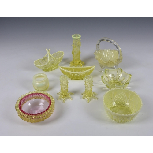 151 - A small collection of Victorian vaseline yellow glass, to include naturalistic tree trunk / thorn va... 