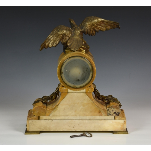 209 - A late 19th century French Sienna marble and ormolu mounted mantel clock, the drum case surmounted b... 