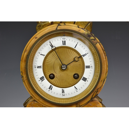 209 - A late 19th century French Sienna marble and ormolu mounted mantel clock, the drum case surmounted b... 