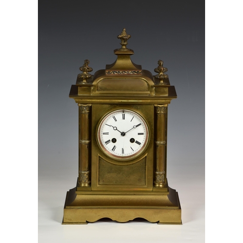 210 - A French brass architectural mantel clock, 19th century, the white Roman enamel dial fronting a two-... 