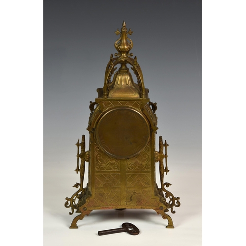 211 - A French cast and pierced brass mantel clock, late 19th century, the Renaissance style case with lan... 