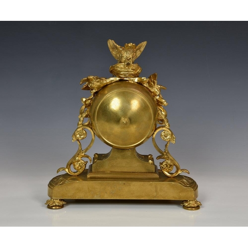 230 - A 19th century ormolu mantel clock in the manner of Jules Moigniez, the twin train movement with out... 