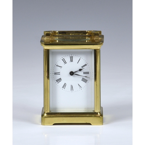 241 - A late 19th century French brass carriage clock with leather travel case, the white enamel dial with... 