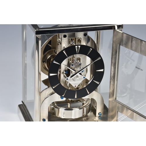 260 - A Jaeger LeCoultre chrome and brushed stainless steel Atmos clock, believed 1970s, the front door wi... 