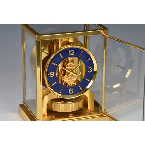 261 - A Jaeger LeCoultre gilt brass Atmos clock, 1980s-90s, with 4¼in. faux-lapis lazuli chapter ring with... 