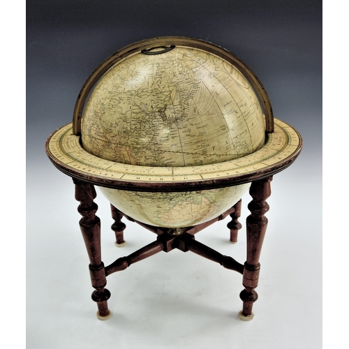 2871 - A Smith's library table terrestrial globe, 20th century, 12in. (30.4cm.) the sphere applied with twe... 