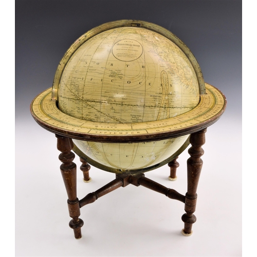 2871 - A Smith's library table terrestrial globe, 20th century, 12in. (30.4cm.) the sphere applied with twe... 