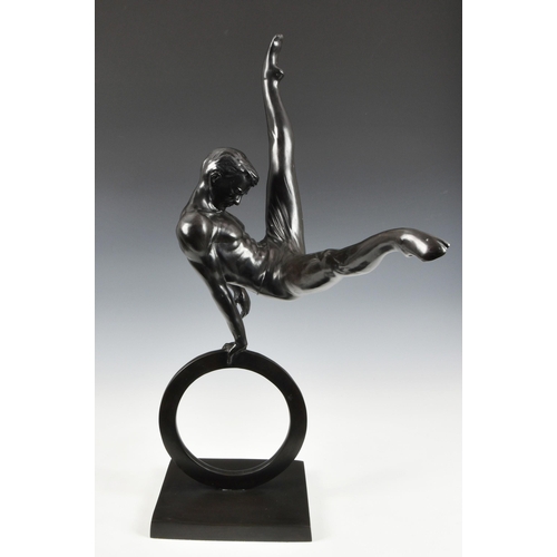 2882 - A large contemporary patinated bronze Male Gymnast sculpture, the gymnast performing flare on a ring... 