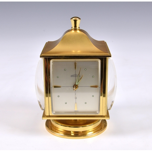 2885 - An Angelus desk compendium weather station, with rotating brass body with clock, barometer, thermome... 