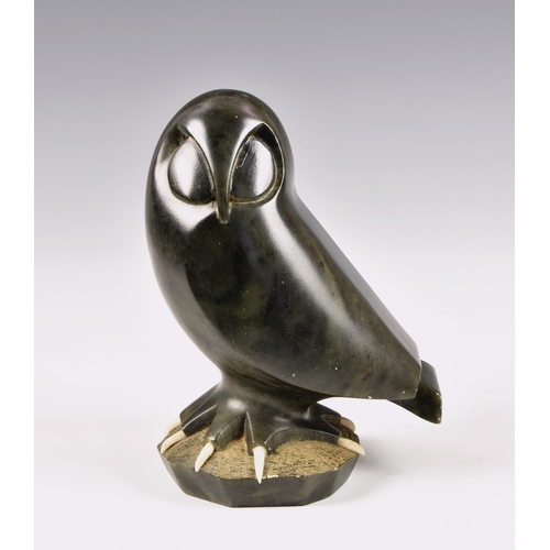 2890 - Tom Hans - Inuit style Haida argillite carving of an owl, signed to base, 7 ½in. (19cm.) high. * Owl... 