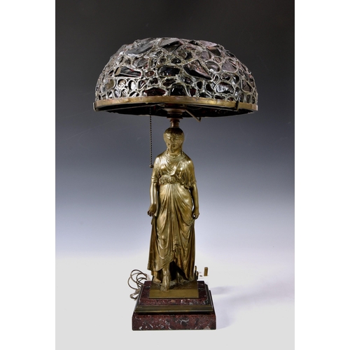 2891 - After Francois Mage (French, d.1910), A Tiffany style classical maiden bronze table lamp, raised on ... 