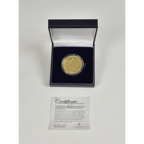 421 - Numismatics interest - The London Mint Gold-plated silver Tristan Da Cunha 'Queens Titles' Five Poun... 