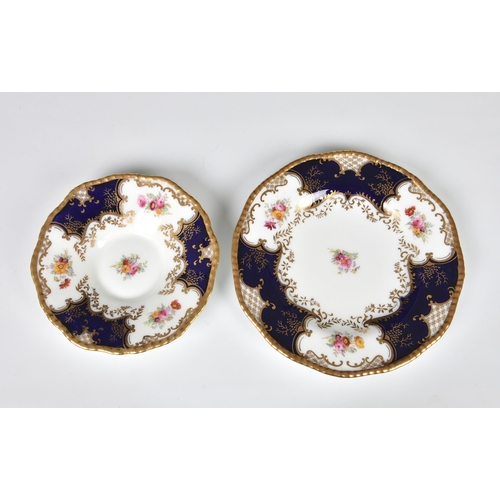 57 - A Coalport bone china part coffee service, c.1910, in the blue 'Batwing' pattern, no. 2665, made for... 