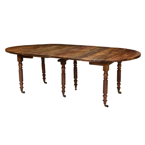 729 - A 19th century and later French provincial walnut concertina action extending dining table, the drop... 