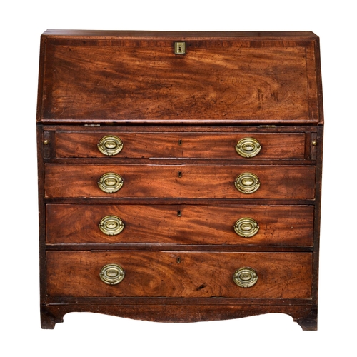 774 - A George III cross banded mahogany bureau, the cross banded and barbers pole strung fall enclosing ... 