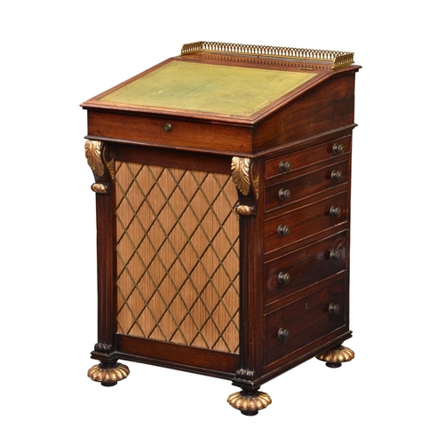 830 - A William IV rosewood and parcel gilt Davenport desk in the manner of Gillows of Lancaster, the slid... 