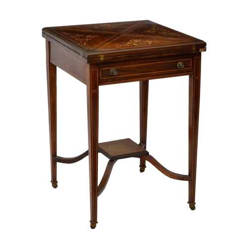 832 - An Edwardian rosewood and marquetry envelope card table, the quartered top swivelling and unfolding ... 