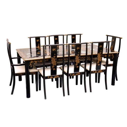 990 - A Chinese painted and black lacquered chinoiserie extending dining table, the pull-out mechanism wit... 