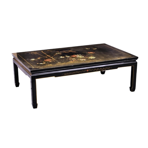 991 - A Chinese painted and black lacquered large coffee table, third quarter 20th century, painted with a... 