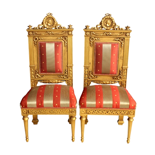 996 - A pair of French Empire style neo-classical giltwood side chairs
late 20th century, the rectangular ... 