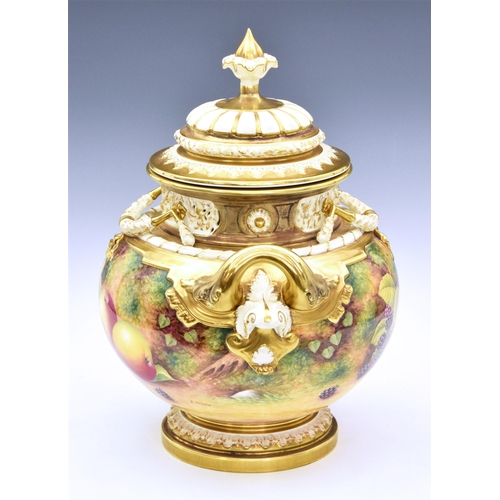 101 - A Royal Worcester large two handled urn and cover, hand-painted with fruit, by D Shinnie, with an or... 