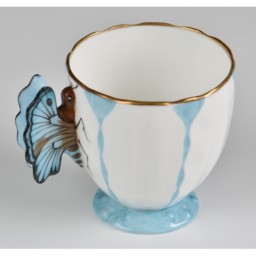 139 - A set of six Aynsley Art Deco blue butterfly coffee cups and saucers, pattern no. B1322, the cups wi... 