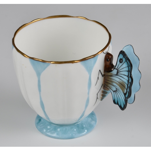 139 - A set of six Aynsley Art Deco blue butterfly coffee cups and saucers, pattern no. B1322, the cups wi... 