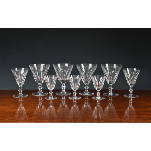 145 - A suite of twenty four (24) Waterford crystal glasses, each with panel cut trumpet bowls on faceted ... 