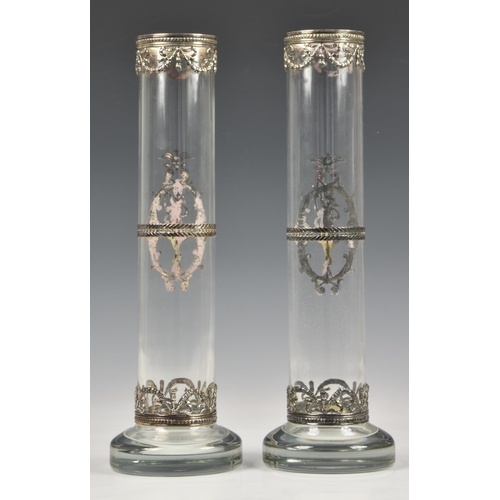 175 - A pair of Portuguese Topazio Casquinha silver plate mounted cylindrical clear glass vases, in a clas... 