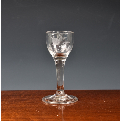 193 - An 18th century wine glass, the ovoid bowl with bird and bud decoration, on a plain, slightly waiste... 