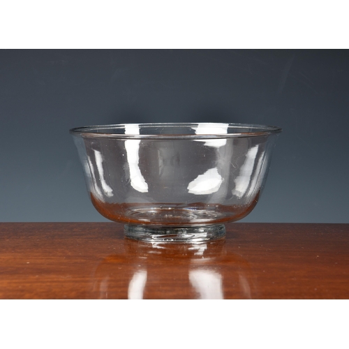 194 - An English 18th century blown glass bowl, of slightly flared, cupped form with everted rim and shall... 