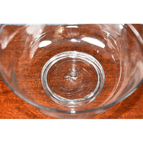 194 - An English 18th century blown glass bowl, of slightly flared, cupped form with everted rim and shall... 