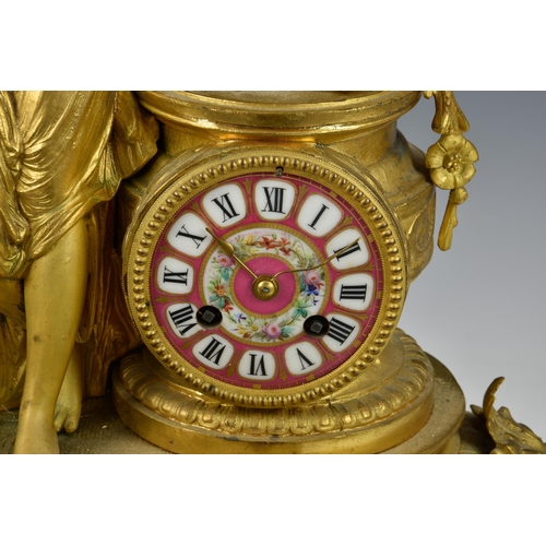 208 - A French gilt metal and porcelain mantel clock, emblematic of Innocence, late 19th / early 20th cent... 